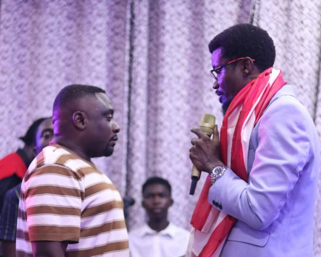 Dr Essel prophesying to a man