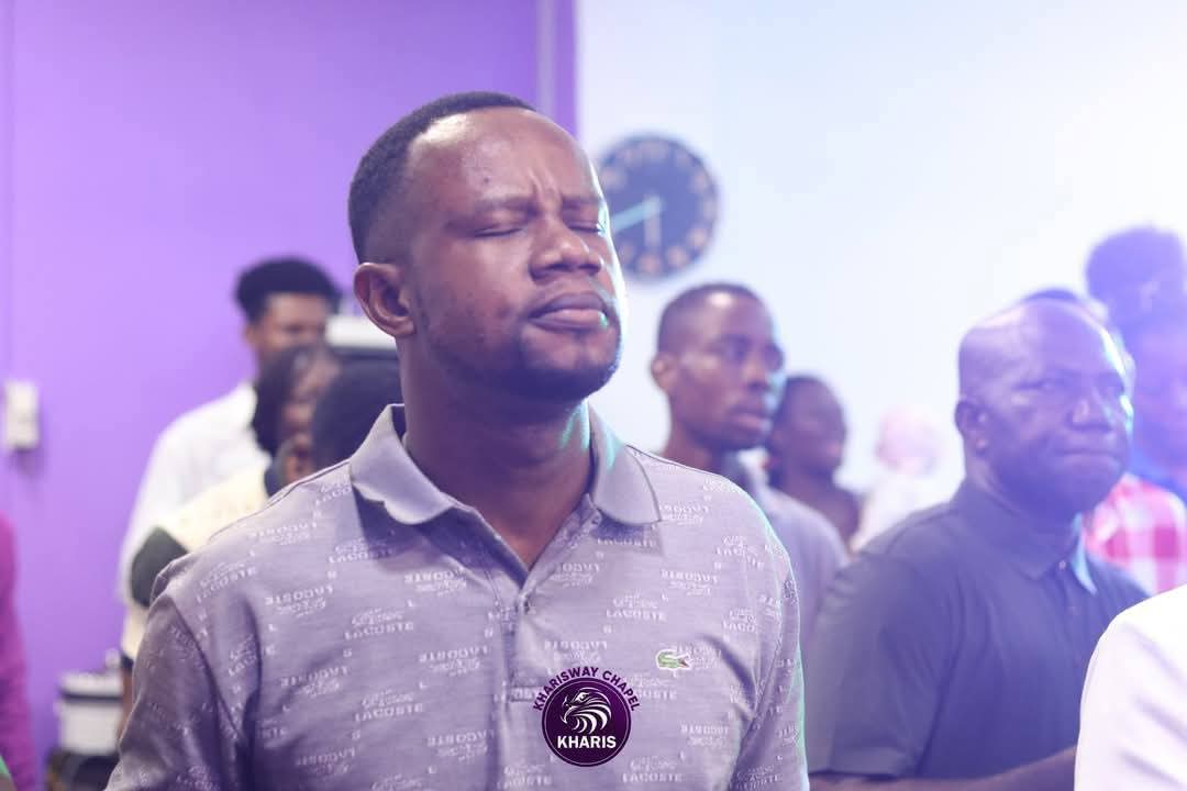 a man in a serious mood of worship