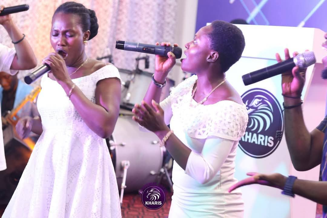 a shot of female choristers singing